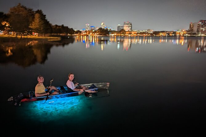LED Glow in the Dark Clear Kayak or Paddleboard in Paradise - Paddling through sunset and city lights